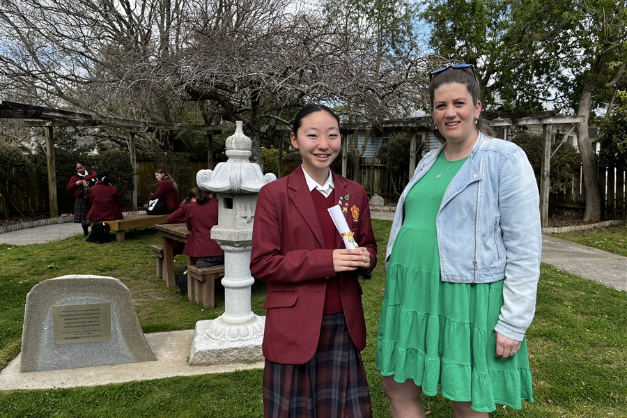 Yuzu with her Sports Award received from her CCM Teacher, Caroline Collie.