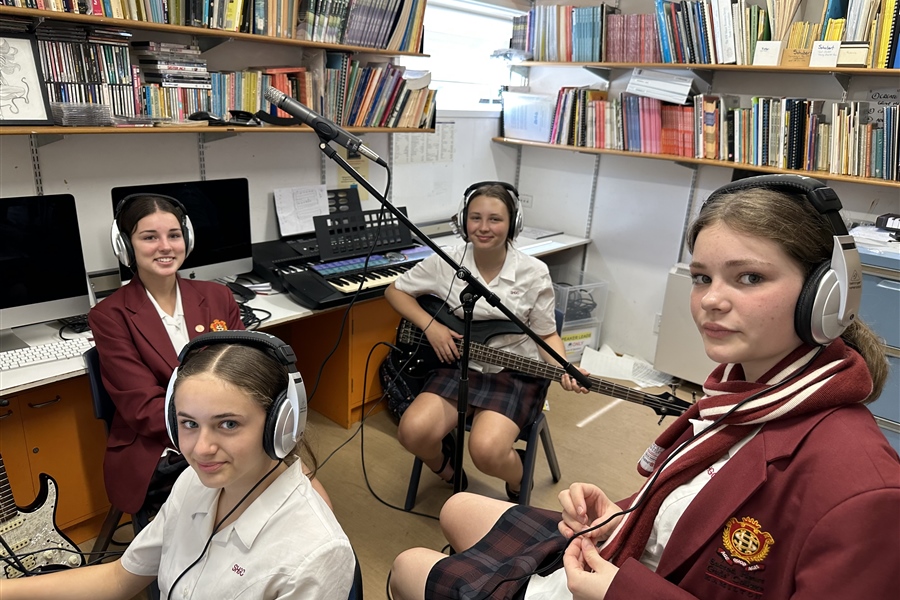 Students recording a version of Mariah Carey